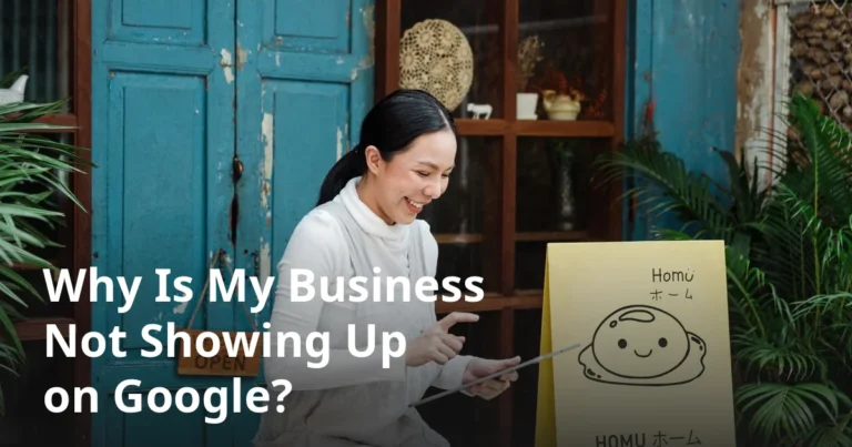 Small business owner checking phone — business not showing up on Google