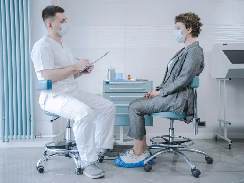 Doctor with patient