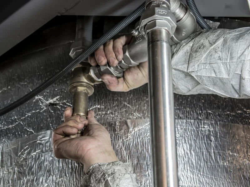 Plumber at work
